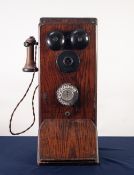 EARLY 20th CENTURY OAK CASE MURAL TELEPHONE, the front with two metal bells over a fixed black
