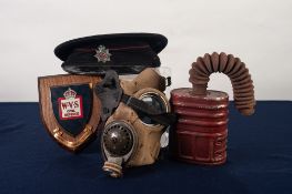 WORLD WAR II 'N.F.A.' CAP with metal badge, a fawn canvas GAS MASK 'WWR Ltd. 1938' with the metal