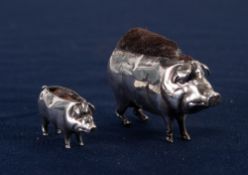 EDWARDIAN SILVER PIN CUSHION, in the form of a pig, 3 1/4" long, Birmingham 1909 and ANOTHER