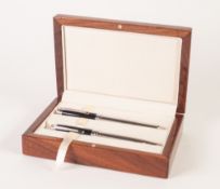 A QUALITY WOODEN CASED PAIR OF LABAN FOUNTAIN AND BALLPOINT PENS with diamonte set clips, the