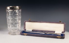 GEORGE VI CUT GLASS FLOWER VASE WITH PLAIN SILVER COLLAR, of footed cylindrical form, 7 ¼" (18.