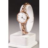 LADY'S 9ct GOLD WRIST WATCH, with Swiss movement, white porcelain Arabic dial, circular case with