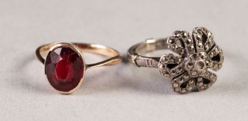 9ct GOLD RING, collet set with an oval garnet, 2.4gms and a SILVER AND MARCASITE FLORAL RING (2)