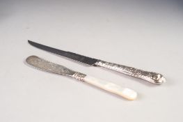 VICTORIAN BUTTER KNIFE, the silver blade floral and foliate scroll engraved blade, mother o'pearl