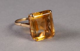 9ct GOLD AND CITRINE DRESS RING, with a large rectangular citrine, in a four claw setting, 8gms,