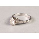 PLATINUM RING WITH A ROUND BRILLIANT CUT SOLITAIRE DIAMOND in eight claw setting, eight tiny