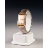 GIRARD-PERREGAUX GENTS OBLONG WRIST WATCH, gilt metal and steel case, plain silvered dial with