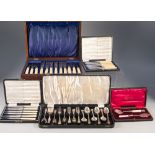 CASED SET OF SIX PAIRS OF ELECTROPLATED FISH EATERS WITH SILVER FERRULES AND BONE HANDLES, in a