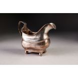 WILLIAM IV SILVER MILK JUG, of bulbous rounded oblong form with a waisted girdle, wriggle engraved