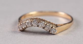 14ct GOLD RING, the top set with a curved row of seven small cubic zirconia, 1.8gms