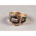 GEORGE IV GOLD AND BLACK ENAMELLED MOURNING RING, the shank embossed 'In Memory of', the cartouche