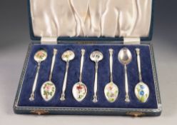 CASED SET OF SIX SILVER AND ENAMELLED COFFEE SPOONS, each enamelled to both sides of the handle
