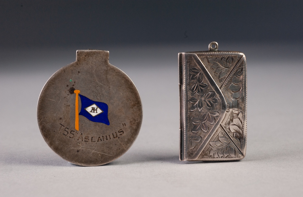 EDWARDIAN FOLIATE ENGRAVED SILVER STAMP HOLDER of envelope pattern, with fixed ring hanger, 1 3/