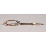 EDWARDIAN 9ct GOLD 'WISHBONE' BROOCH, set with graduated turquoise, 1 1/2" long, Chester 1902, 2.
