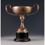 GEORGE V PRESENTATION SILVER TWO HANDLED PEDESTAL 'CAPTAINS CUP', with weighted base, 8 ¾" (22.