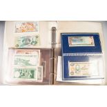 RING BINDER CONTAINING A COLLECTION OF GB AND WORLD BANK NOTES, many in uncirculated condition