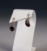 PAIR OF SILVER SCREW FASTENING DROP EARRINGS each set with a pebble garnet