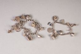 A SILVER CURB PATTERN CHARM BRACELET, with padlock clasp and fourteen silver charms and ANOTHER