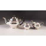 EDWARD VII BACHELORS THREE PIECE SILVER TEA SET BY ELKINGTON & Co, of plain oval form with cyma