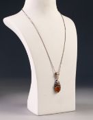 SILVER FINE CHAIN NECKLACE and a craft-made SILVER PENDANT with collet set cabochon oval amber