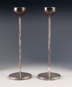 MODERN PAIR OF STYLISH SILVER CANDLESTICKS BY ROBERT WELCH, each of slender, cylindrical form with