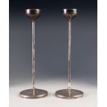 MODERN PAIR OF STYLISH SILVER CANDLESTICKS BY ROBERT WELCH, each of slender, cylindrical form with