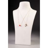 18ct GOLD FINE CHAIN NECKLACE with single pink coral bead front flanked by two tiny gold beads,