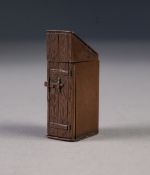 VICTORIAN BRONZE NOVELTY VESTA BOX in the form of an outside toilet, with hinged lid and hinge