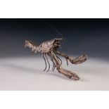 AN ORIENTAL SILVER COLOURED METAL ARTICULATED LIFE SIZE MODEL OF A LOBSTER, spring loaded