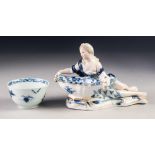LATE NINETEENTH/ EARLY TWENTIETH CENTURY MEISSEN BLUE AND WHITE PORCELAIN FIGURAL SALT, heightened
