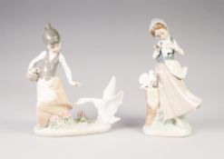TWO LLADRO PORCELAIN GROUPS OF YOUNG GIRLS AND BIRDS, one modelled standing beside a tree stump with