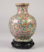 A CHINESE LATE QING DYNASTY PORCELAIN GLOBULAR VASE, painted autour in polychrome enamels with