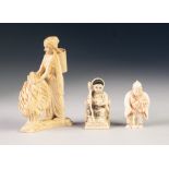 THREE EARLY TWENTIETH CENTURY CARVED IVORY FIGURES, comprising: NETSUKE OF AN OLD MAN, with