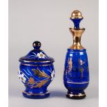 MODERN MURANO BLUE GLASS SOUVENIR DECANTER AND STOPPER, of footed, tapering form, gilt printed