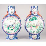PAIR OF TWENTIETH CENTURY CHINESE FAMILLE ROSE PORCELAIN LARGE MOON FLASKS, each of typical form
