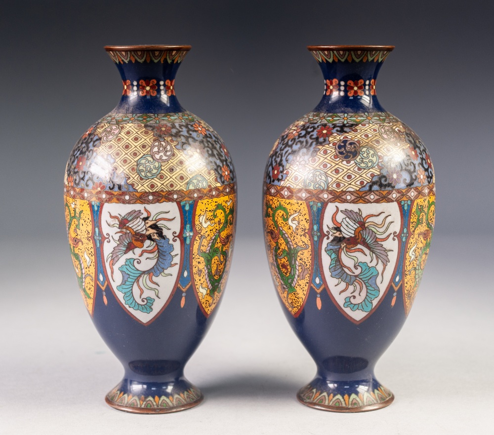 PAIR OF JAPANESE LATE MEIJI PERIOD CLOISONNÉ VASES, each of footed ovoid form with waisted, short