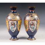 PAIR OF JAPANESE LATE MEIJI PERIOD CLOISONNÉ VASES, each of footed ovoid form with waisted, short