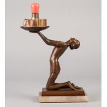 ART DECO PATINATED BRONZE FIGURAL TABLE LAMP, modelled as a kneeling female figure with head back