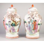 A PAIR OF TWENTIETH CENTURY CHINESE PORCELAIN INVERTED BALUSTER SHAPE VASES WITH DOMED COVERS