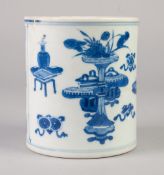 A CHINESE QING DYNASTY BLUE AND WHITE PORCELAIN BITONG OR BRUSH POT painted with precious and