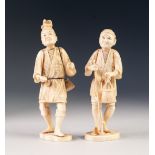 TWO JAPANESE MEIJI PERIOD CARVED SECTIONAL IVORY FIGURES OF STREET VENDORS, both modelled standing