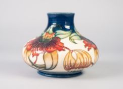 MODERN MOORCROFT POTTERY COMPRESSED BALUSTER SHAPE VASE, tube line decorated with orchids, impressed