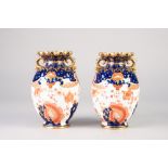 A PAIR OF LATE NINETEENTH CENTURY ROYAL CROWN DERBY PORCELAIN OVOID TWO HANDLED VASES, with