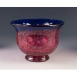 MONART MOTTLED PINK GLASS FOOTED BOWL, of steep sided form with blue tinted flared rim, 5 ¾" (14.