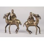 PAIR OF CHINESE CAST BRONZE INCENSE BURNER AND COVER GROUPS, each modelled as a deity riding side