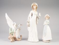 LLADRO PORCELAIN FEMALE FIGURE, 14" (35.5cm) high, also TWO NAO PIECES (3)