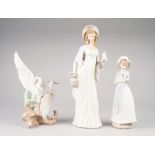 LLADRO PORCELAIN FEMALE FIGURE, 14" (35.5cm) high, also TWO NAO PIECES (3)