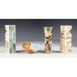 PAIR OF CARN POTTERY SPECIMEN VASES, each of shaped oblong form, glazed in mottled tomes of blue and