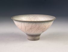 BILL WINSTANLEY? PALE PINK CRACKLE RAKU GLAZED STUDIO POTTERY FOOTED DISH, with fading green centre,