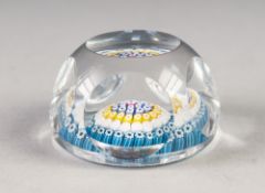 WHITEFRIARS MILLEFIORI GLASS PAPERWEIGHT, facet cut, with concentric canes in blue, yellow, white